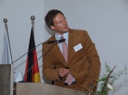 Dr. Malte Rubach erläutert die Hintergründe der Studie "Potenziale zur Energieeinsparung durch Vermeidung von Lebensmittelverschwendung".