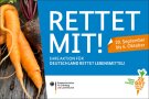 Krumm gewachsene Karotte mit Schriftzug Rettet Mit!